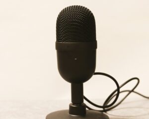a microphone is plugged into a charger